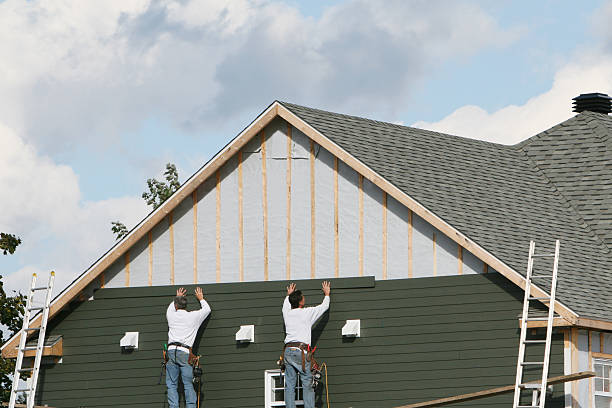 Professional Siding Installation technician working in Plano, TX